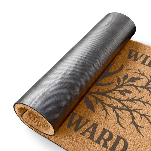 Rectangular coir doormat measuring 24x16 inches featuring black printed text reading “Blood of the Wild, Born of the Ward” with an all-seeing eye symbol and antler-branch illustration. Made from natural coconut fiber with a durable black vinyl backing, this outdoor doormat is weather-resistant and ideal for gothic, witchy, or folklore-inspired entryways.